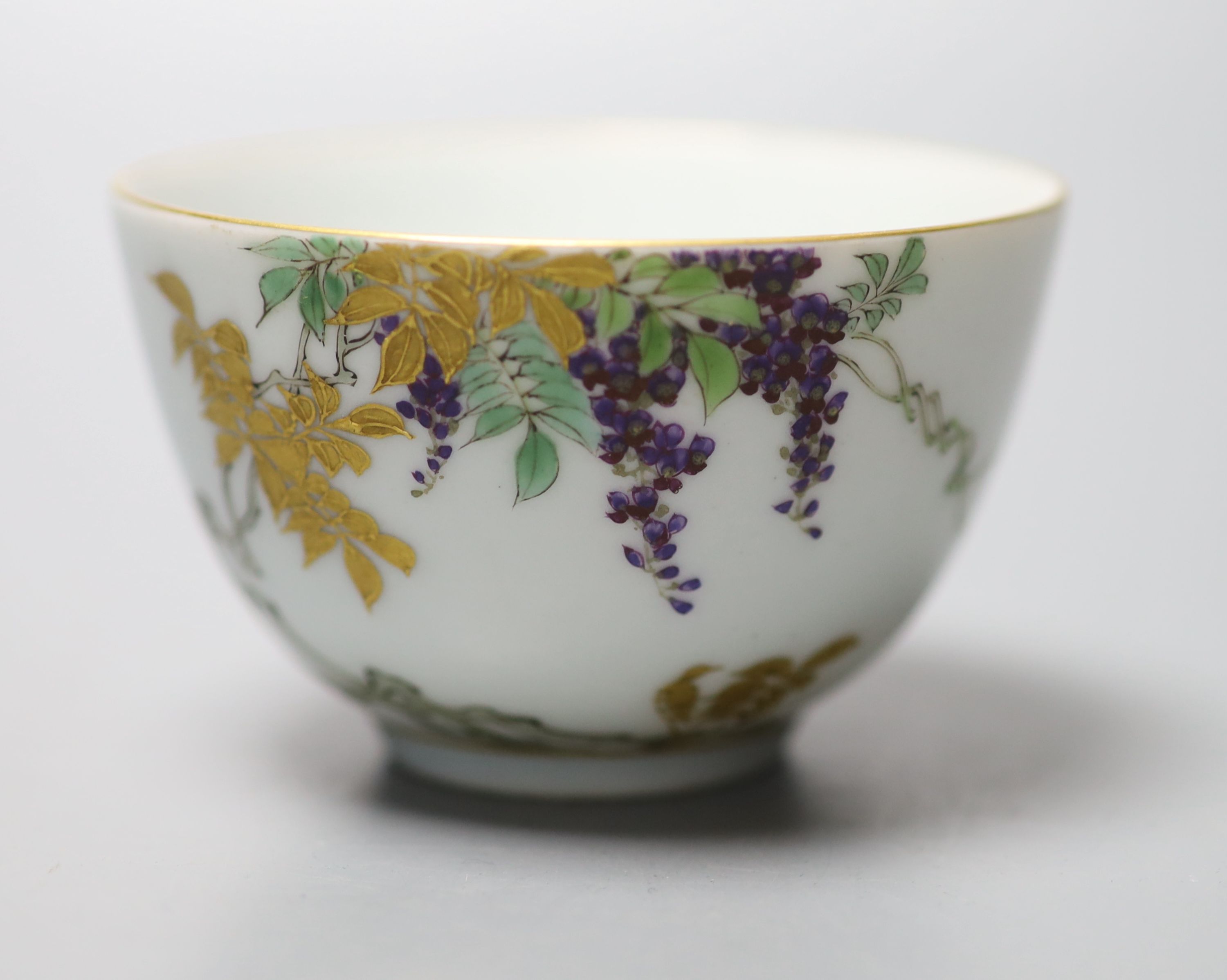 An unusual Japanese Kinkozan porcelain tea bowl, six character mark to base, Dia 8cm